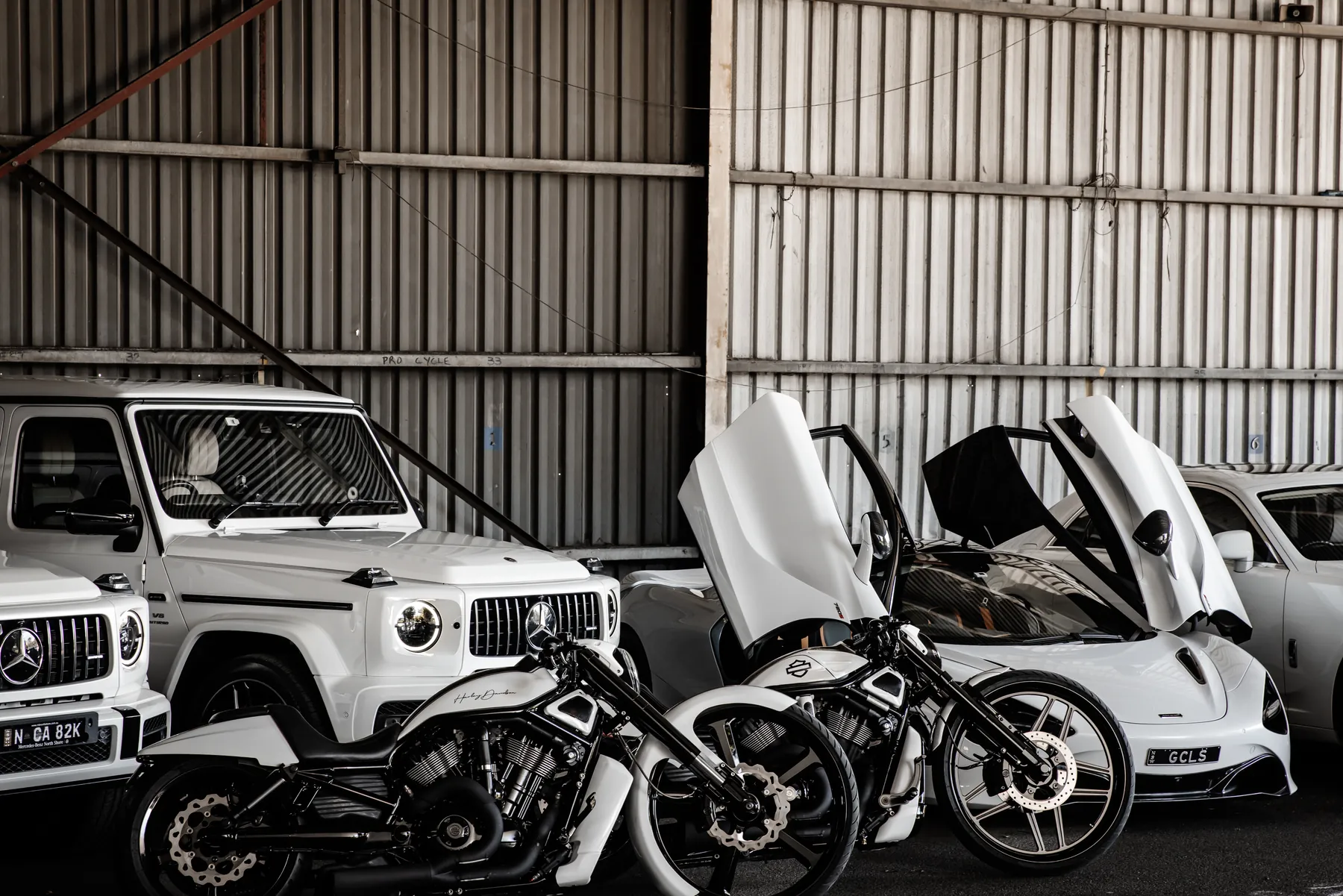 A chauffeured luxury wedding car convoy in Sydney