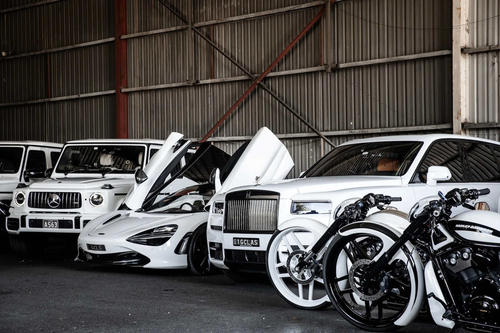Cars and outriders, together