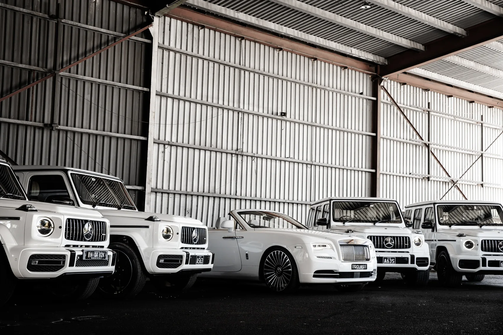 A white Rolls-Royce Dawn convertible — chauffeured hire in Sydney
