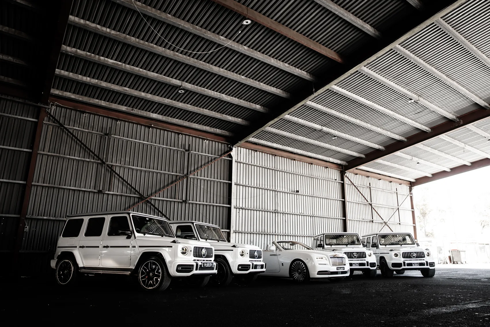 A white Rolls-Royce Dawn convertible — chauffeured hire in Sydney