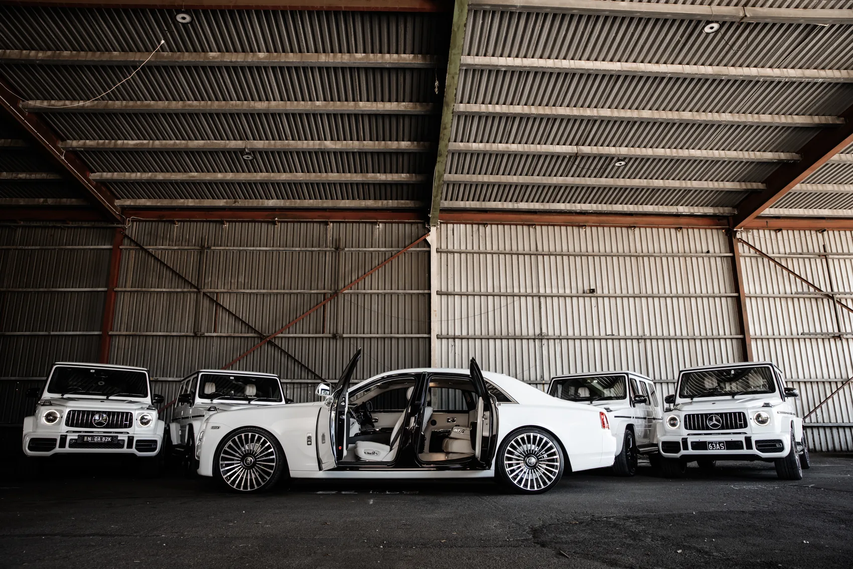A matched line-up of luxury wedding cars from the G Class Hire fleet, presentation-detailed and ready