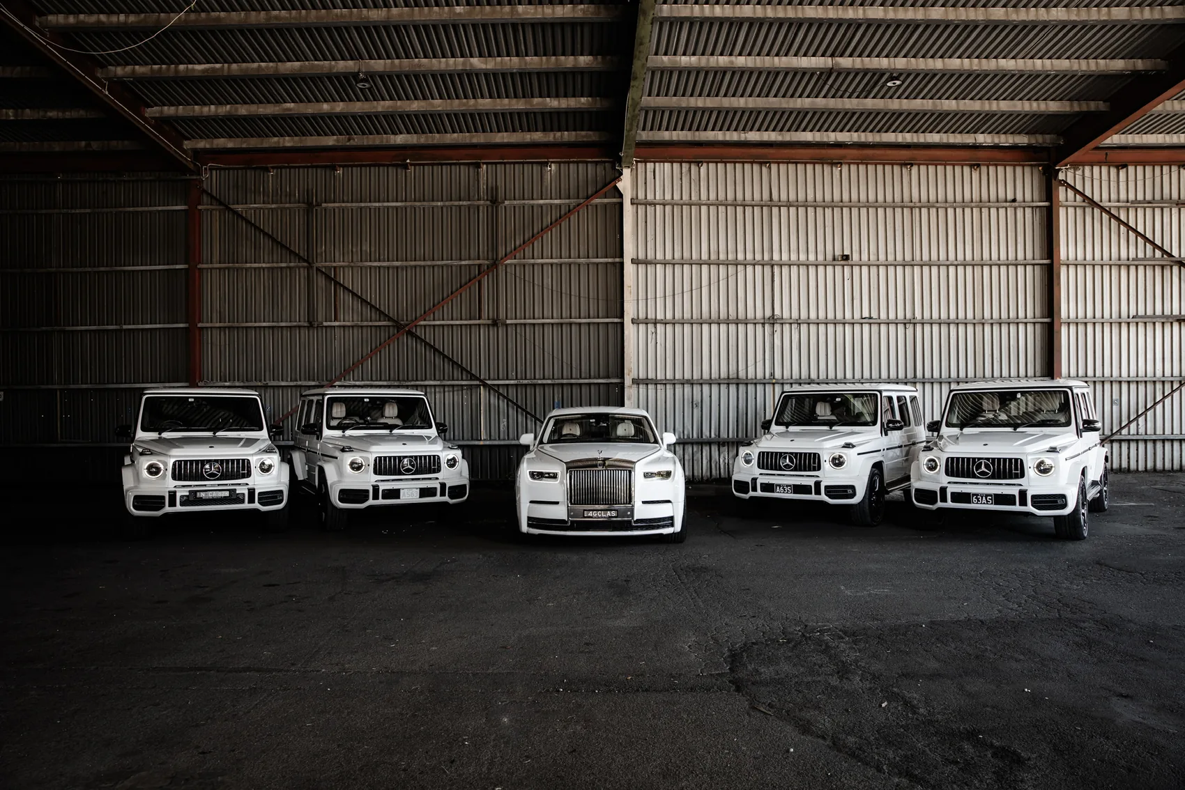 G-Wagons flanking the Phantom