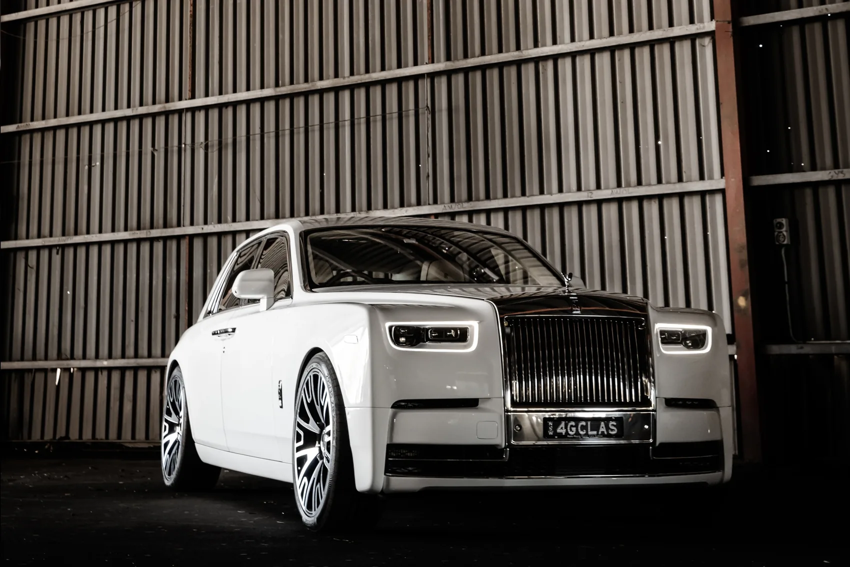 A white Rolls-Royce Phantom — chauffeured hire in Sydney