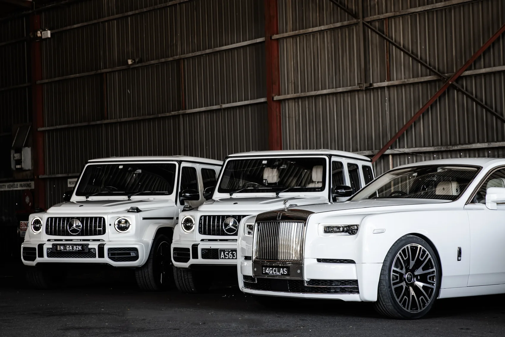 A white luxury wedding car line-up — G Class Hire Sydney